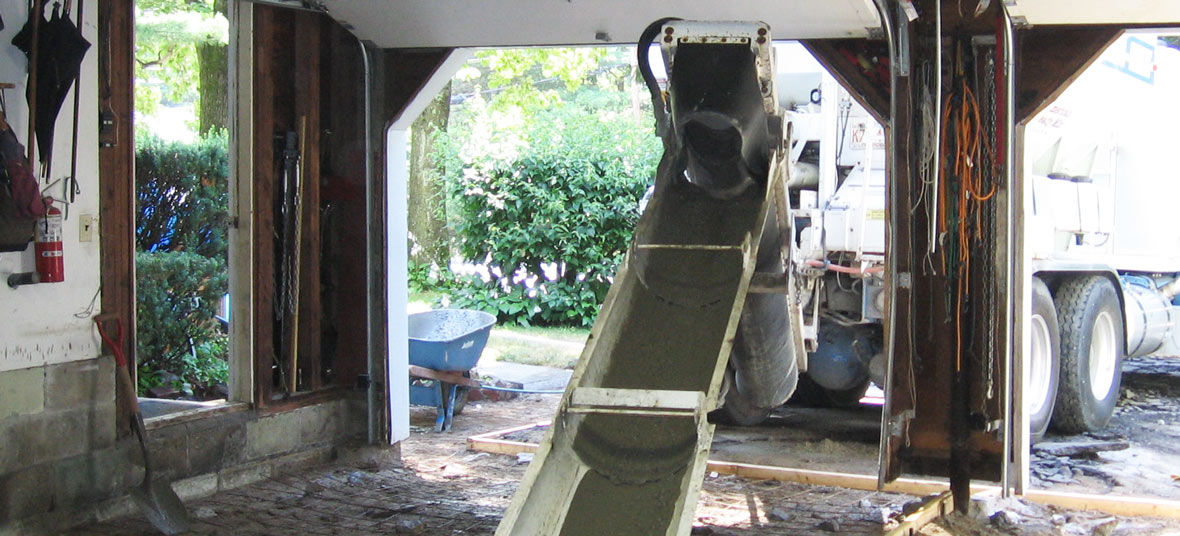 Pouring concrete for a residential indoor garage