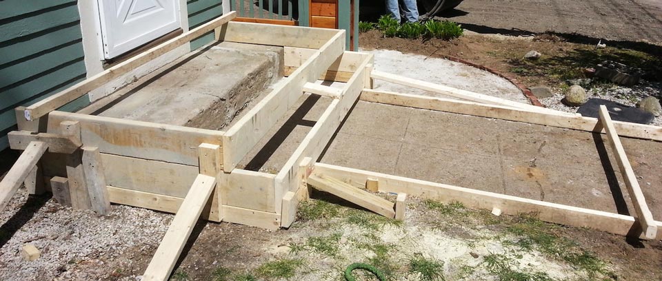 Pouring concrete for sidewalks around a home