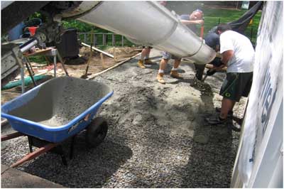 Pouring concrete for an outdoor residential patio